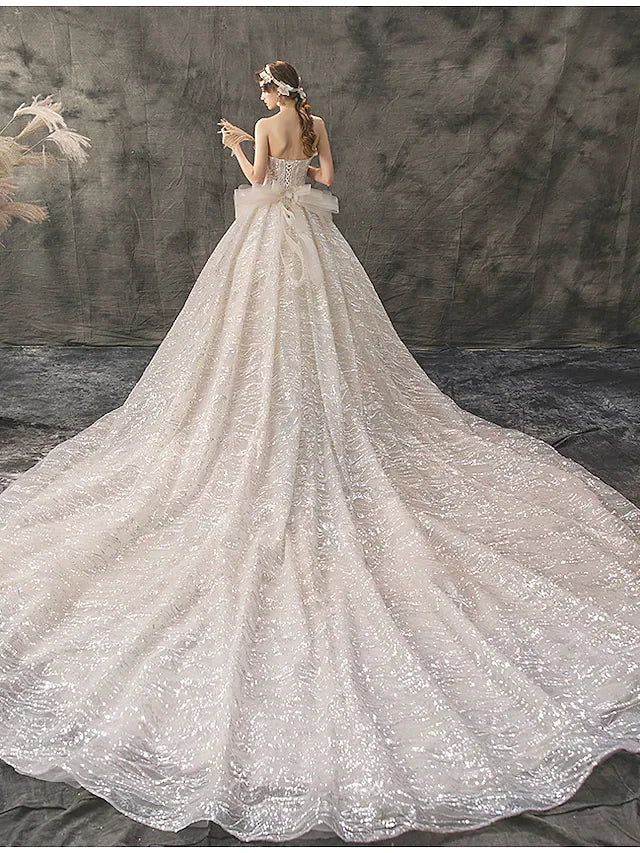 Princess Ball Gown Wedding Dresses Strapless Chapel Train Lace Tulle Sequined Sleeveless Formal Luxurious Sparkle & Shine with Bow(s) Appliques